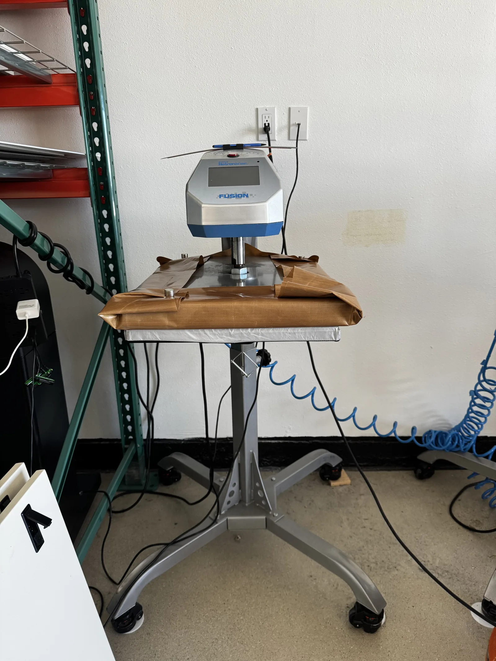 16" × 20" heat presses, on stands